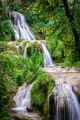 A Small Waterfall Shot A Slow Shutter With A Small Tree Canvas Print