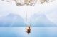 Beautiful Young Woman On The Swing Canvas Print