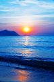 Beautiful Sunset on the Blue Beach Canvas Print
